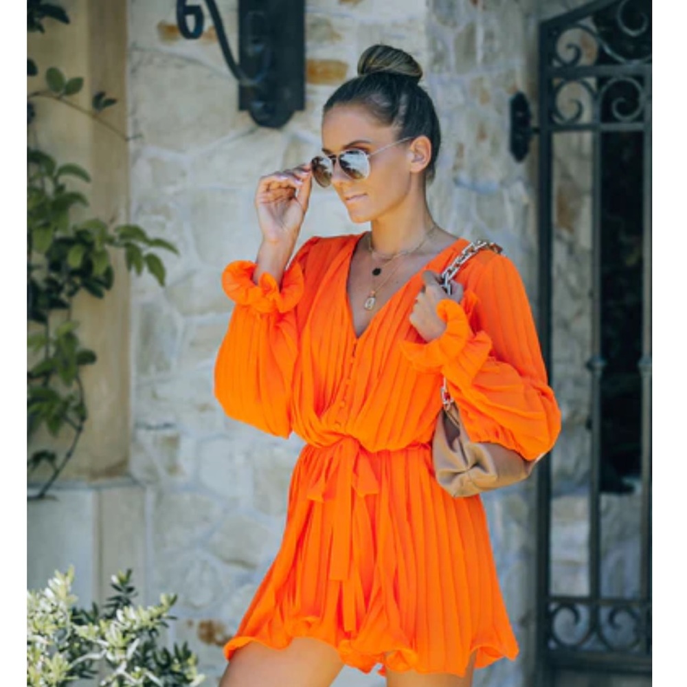 Orange pleated romper